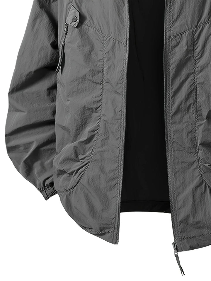 Carter - Rompevientos impermeable para exteriores con capucha ajustable