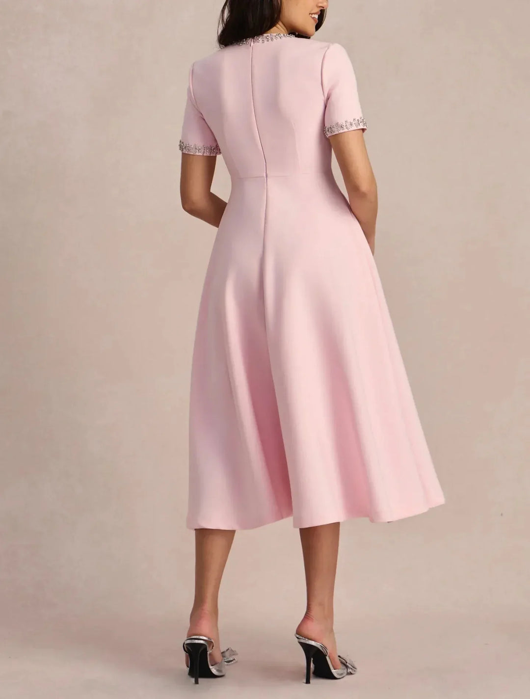 Raffaella | Vestido acampanado con lazos y abalorios
