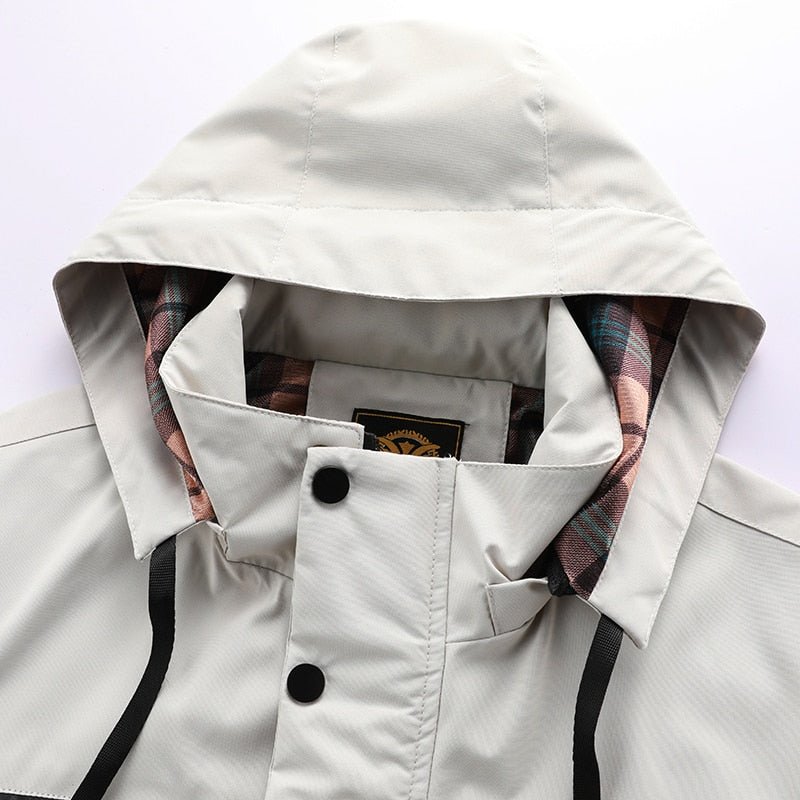 Logan - Chaqueta cómoda impermeable y cortaviento con múltiples bolsillos